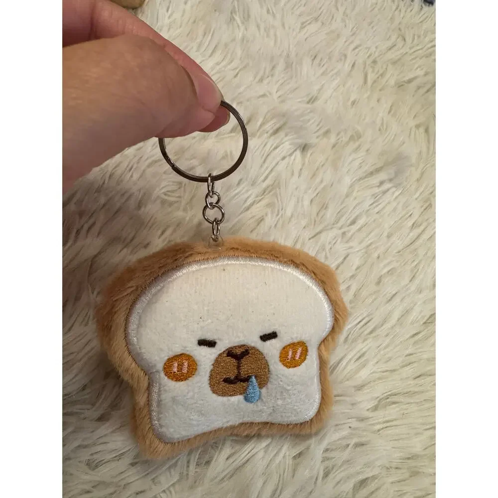 Capybara  bread  toast keychain with embroidered face on a slice of bread